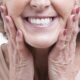 Older women happy with her dentures