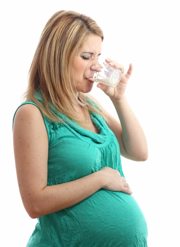 pregnant woman drinking milk
